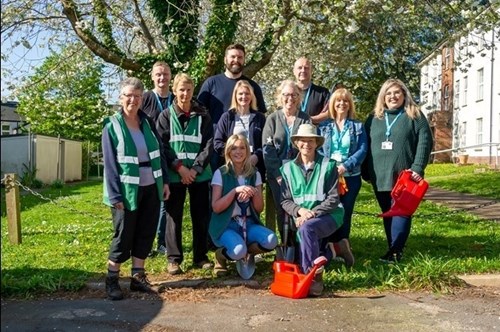 A picture of a group of EDDC Parks and Gardens volunteers posing as a group
